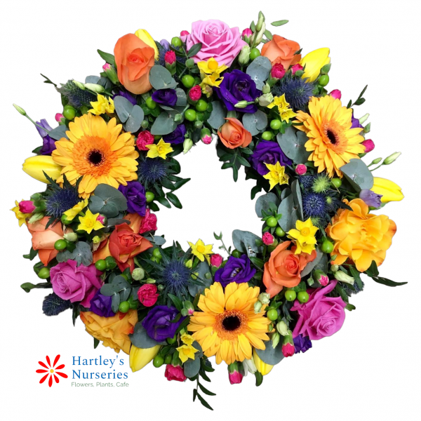 1666195063ColourfulwreathPhotoRoom.png